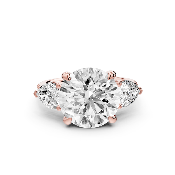 Alma - 4ct 18k rose gold round center stone with two pear shaped diamonds and Pavé. Three stone oval and pear engagment ring with Pavé