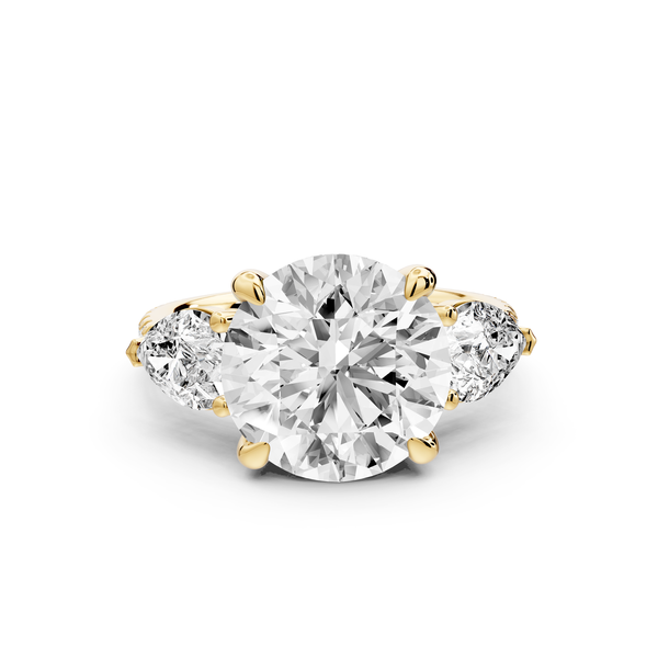 Alma - 4ct 14k yellow gold round center stone with two pear shaped diamonds and Pavé. Three stone oval and pear engagment ring with Pavé