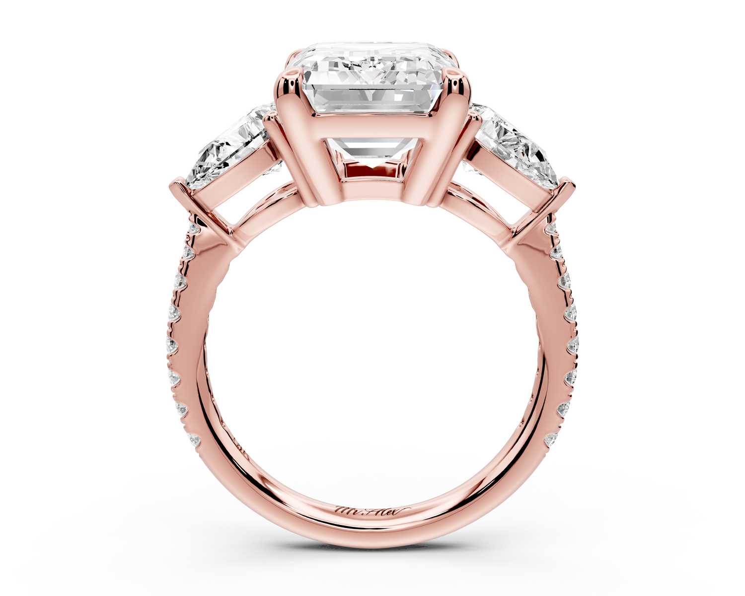 Alma - 5ct 14k rose gold emerald center stone with two pear shaped diamonds and pavé. Three stone oval and pear Engagement ring with Pavé
