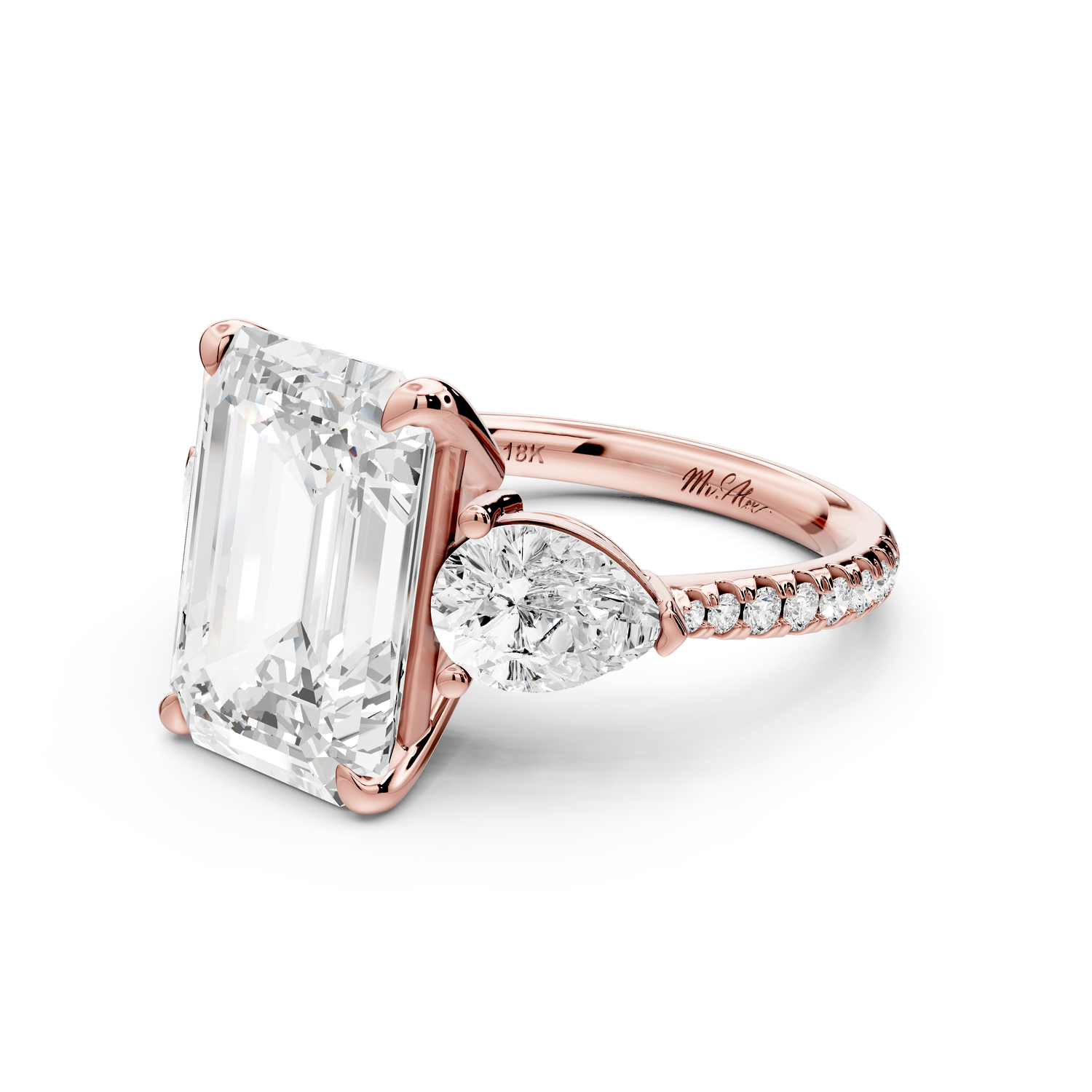 Alma - 5ct 14k rose gold emerald center stone with two pear shaped diamonds and pavé. Three stone oval and pear Engagement ring with Pavé