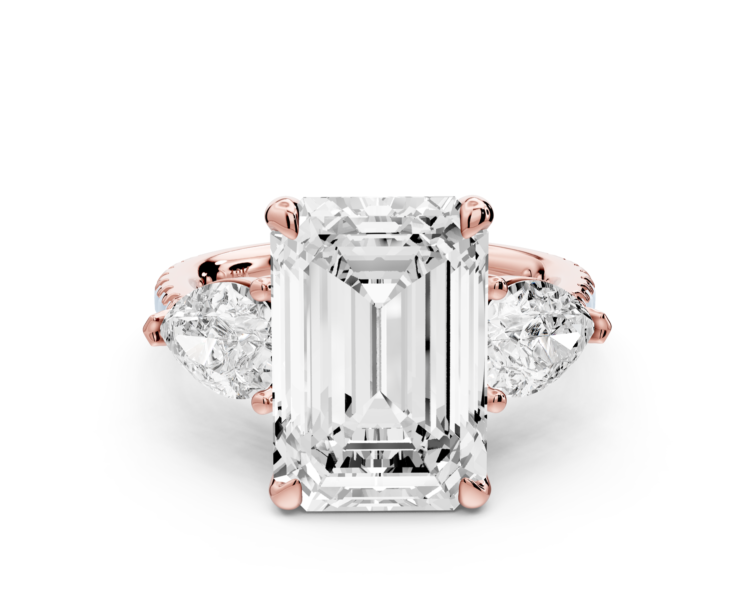 Alma - 5ct 14k rose gold emerald center stone with two pear shaped diamonds and pavé. Three stone oval and pear Engagement ring with Pavé