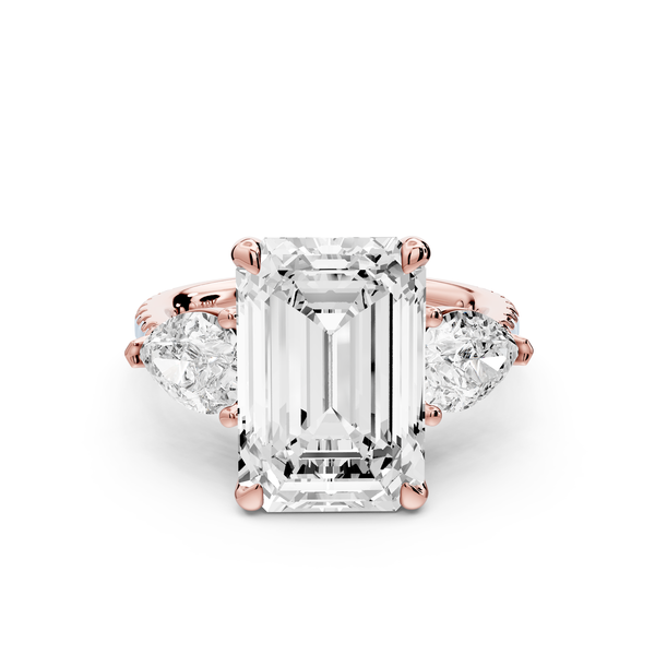 Alma - 5ct 14k rose gold emerald center stone with two pear shaped diamonds and pavé. Three stone oval and pear Engagement ring with Pavé