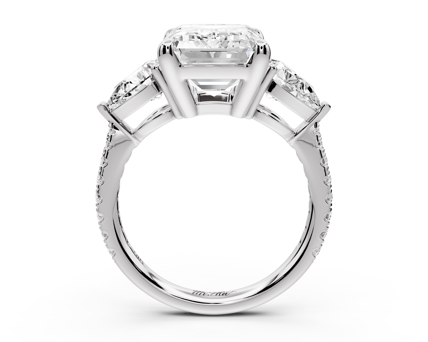 Alma - 5ct 14k white gold emerald center stone with two pear shaped diamonds and pavé. Three stone oval and pear Engagement ring with Pavé