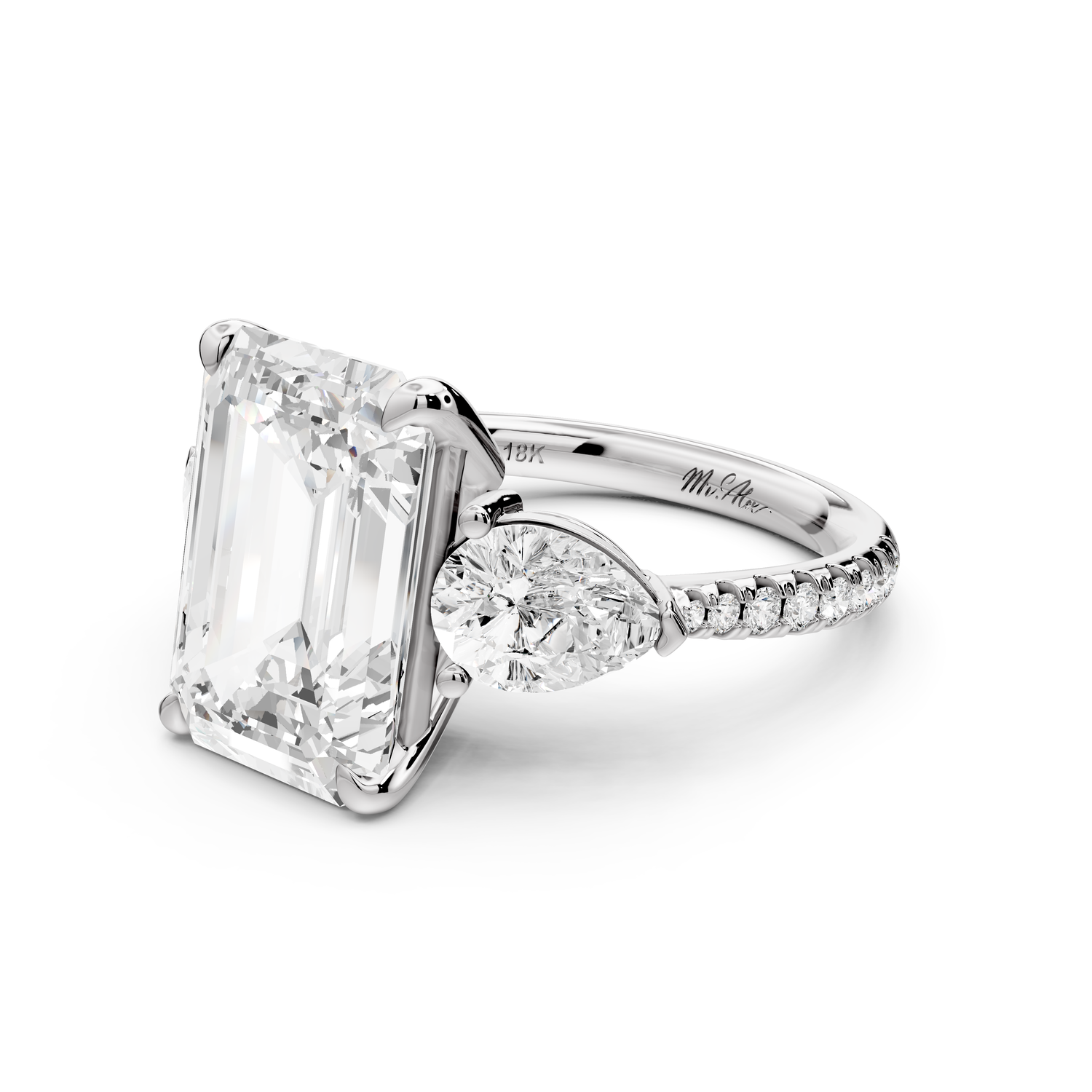 Alma - 5ct 14k white gold emerald center stone with two pear shaped diamonds and pavé. Three stone oval and pear Engagement ring with Pavé