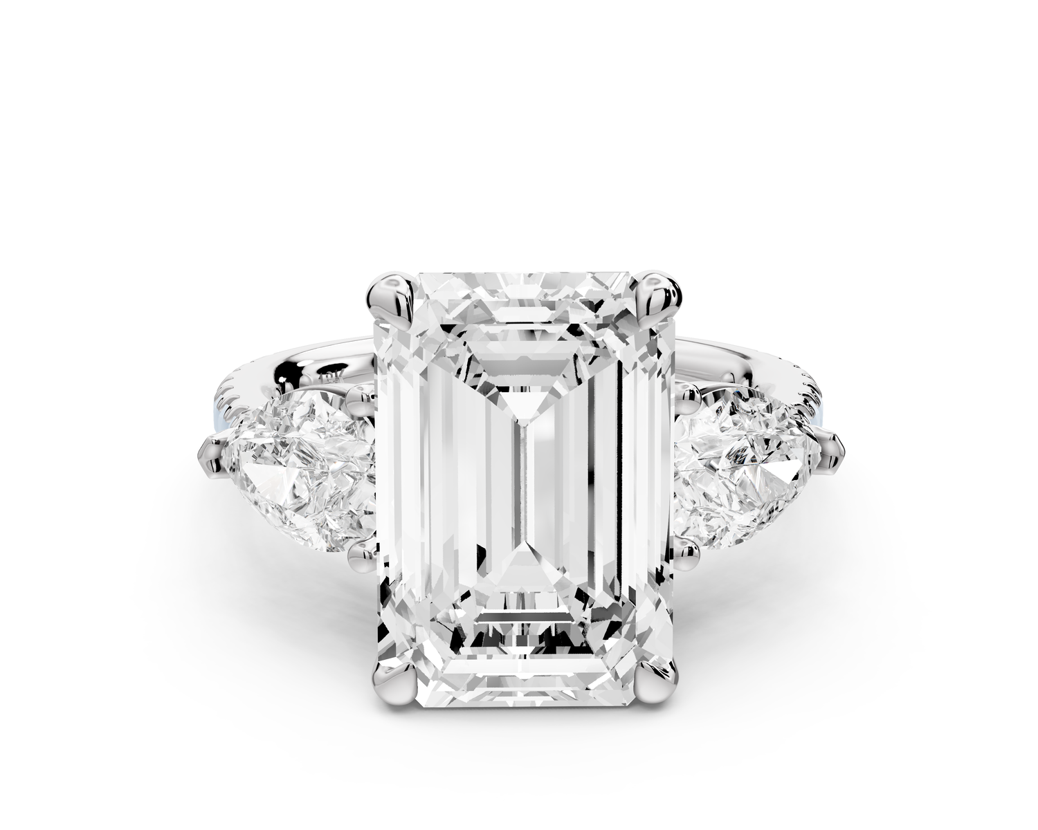 Alma - 5ct 14k white gold emerald center stone with two pear shaped diamonds and pavé. Three stone oval and pear Engagement ring with Pavé