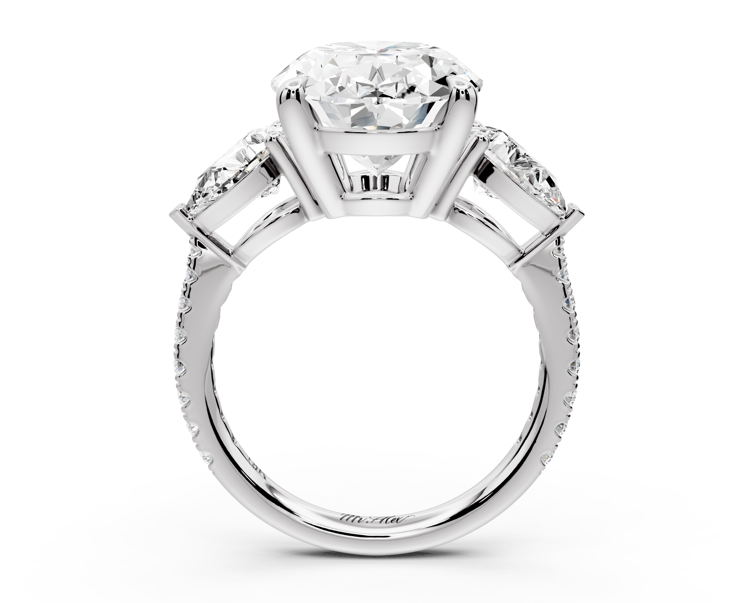 Alma - 5ct 18k white gold oval center stone with two pear shaped diamonds and pavé. Three stone oval and pear Engagement ring with Pavé