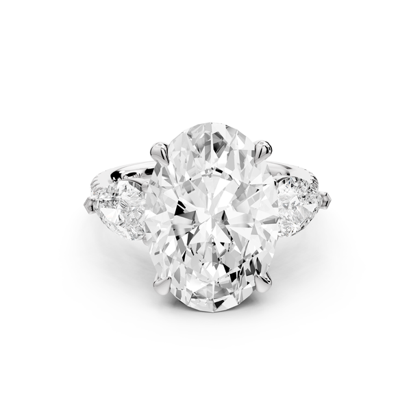 Alma - 5ct 14k white gold oval center stone with two pear shaped diamonds and pavé. Three stone oval and pear Engagement ring with Pavé