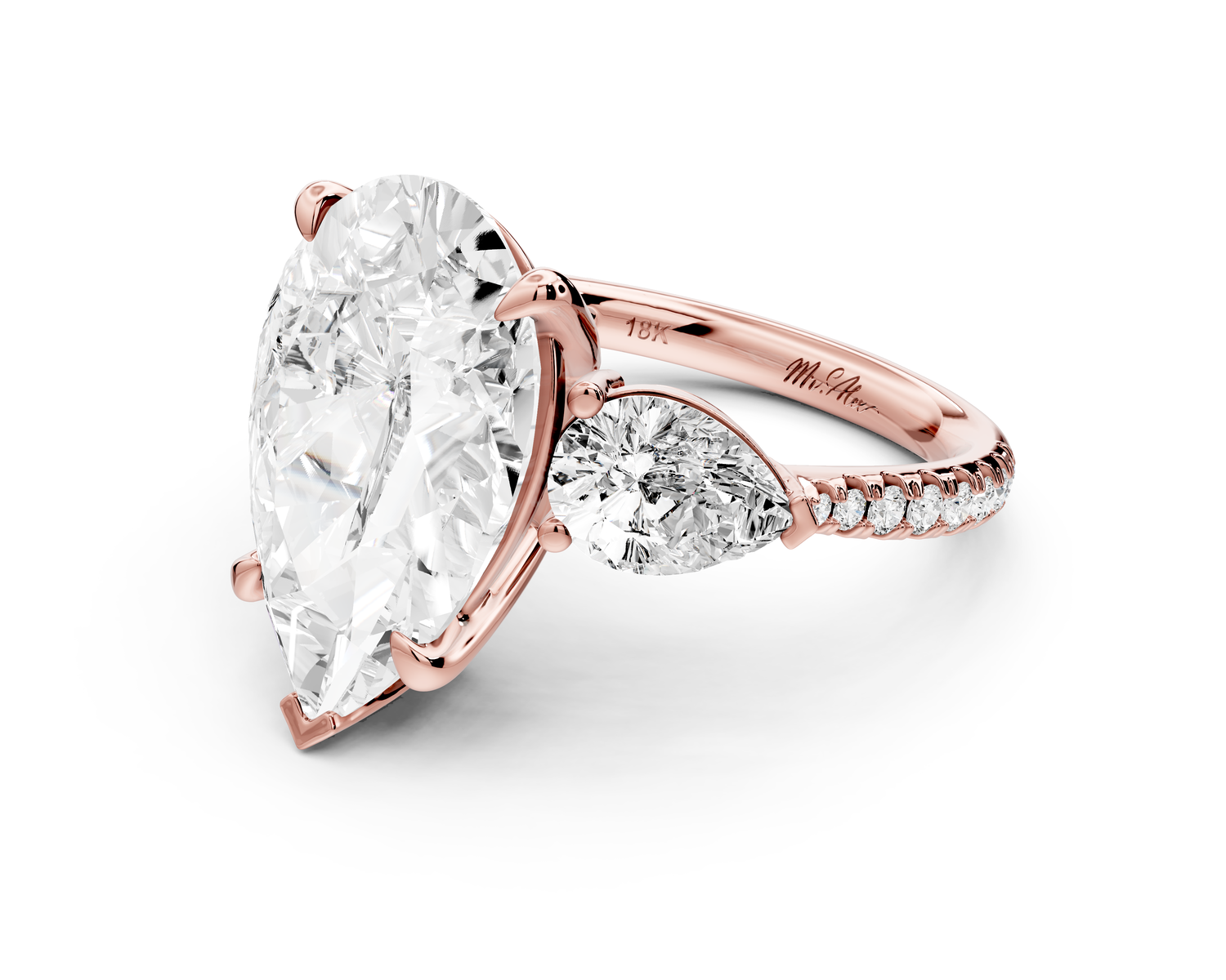 Alma - 5ct 14k rose gold pear center stone with two pear shaped diamonds and pavé. Three stone oval and pear Engagement ring with Pavé
