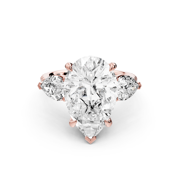 Alma - 5ct 14k rose gold pear center stone with two pear shaped diamonds and pavé. Three stone oval and pear Engagement ring with Pavé