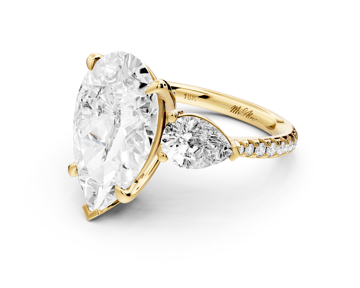 Alma - 5ct 14k yellow gold pear center stone with two pear shaped diamonds and pavé. Three stone oval and pear Engagement ring with Pavé