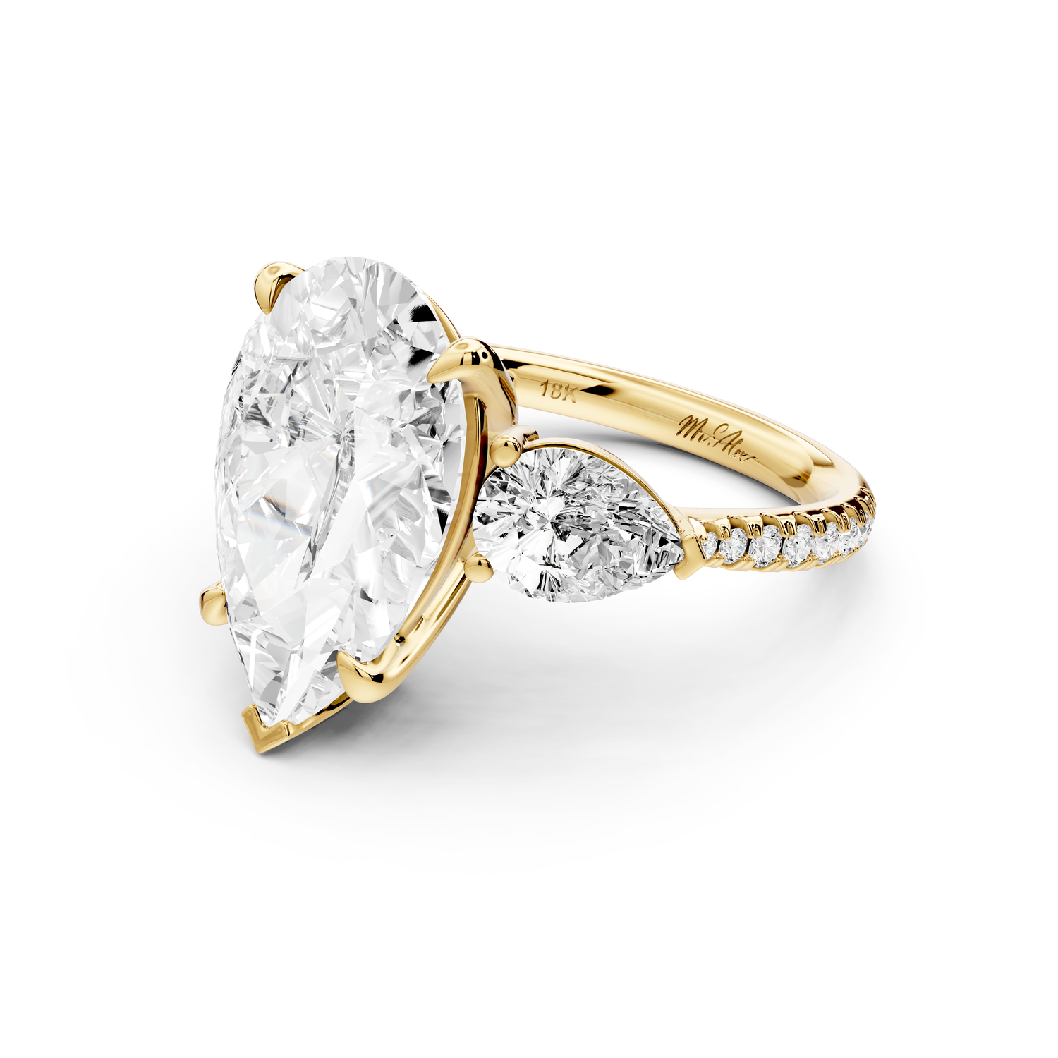 Alma - 5ct 14k yellow gold pear center stone with two pear shaped diamonds and pavé. Three stone oval and pear Engagement ring with Pavé