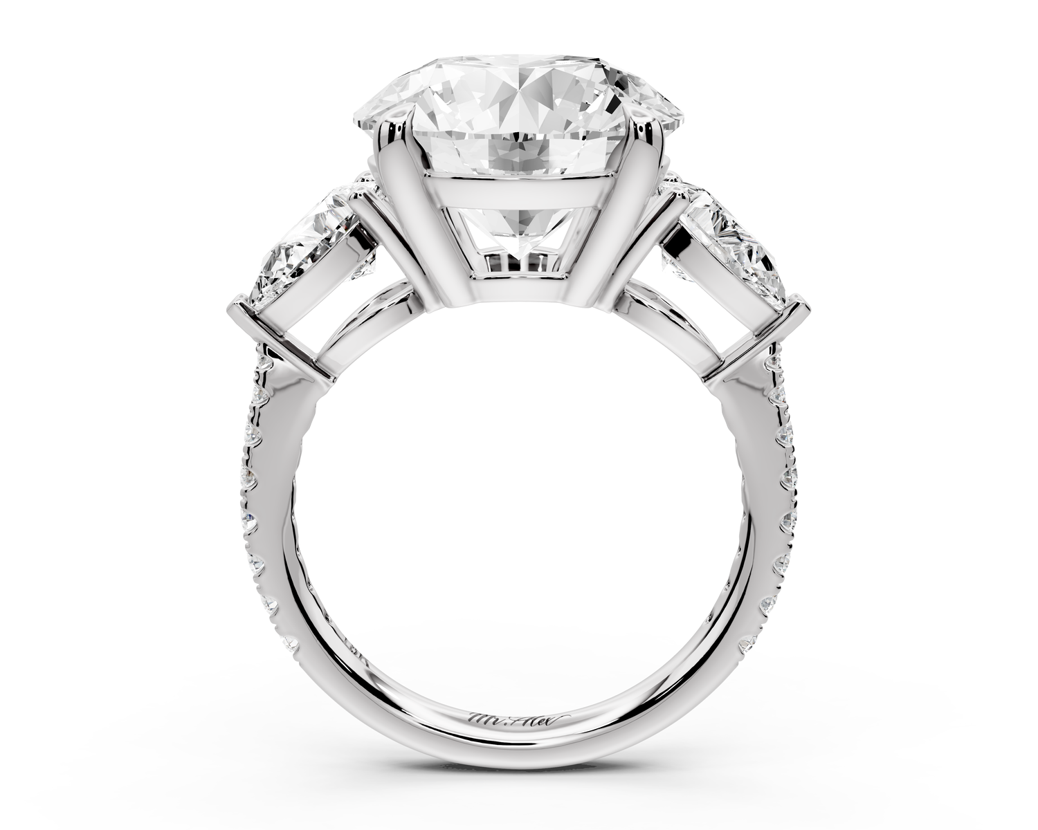 Alma - 5ct 18k white gold round center stone with two pear shaped diamonds and pavé. Three stone oval and pear engagment ring with Pavé