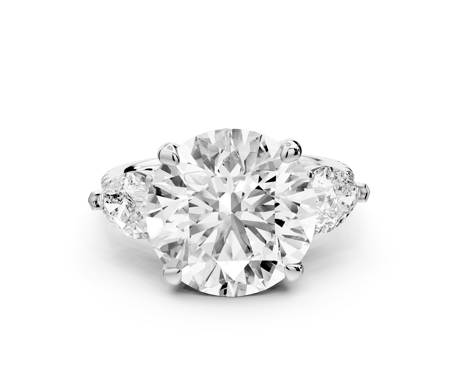 Alma - 5ct platinum round center stone with two pear shaped diamonds and pavé. Three stone oval and pear engagment ring with Pavé