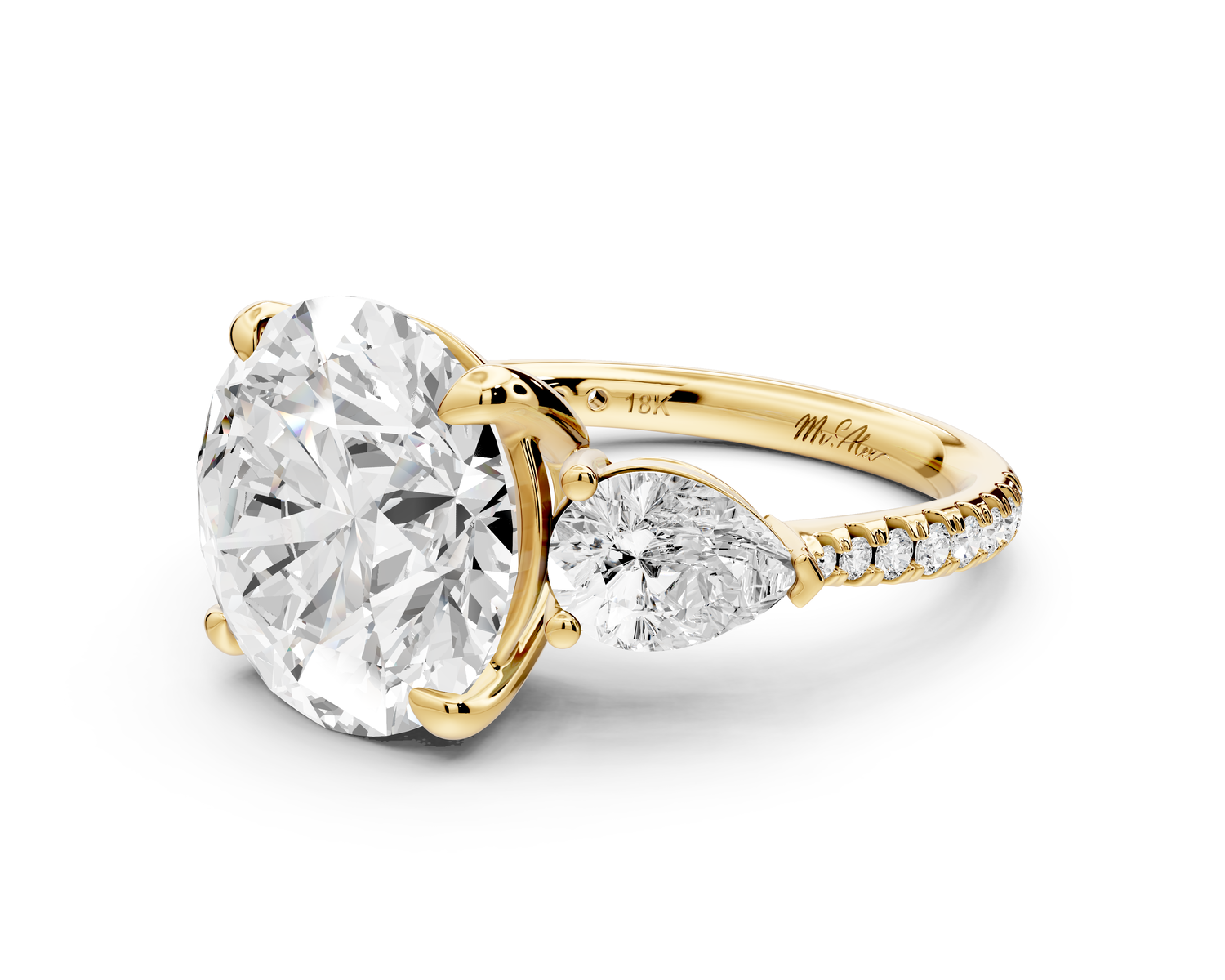Alma - 5ct 14k yellow gold round center stone with two pear shaped diamonds and pavé. Three stone oval and pear engagment ring with Pavé