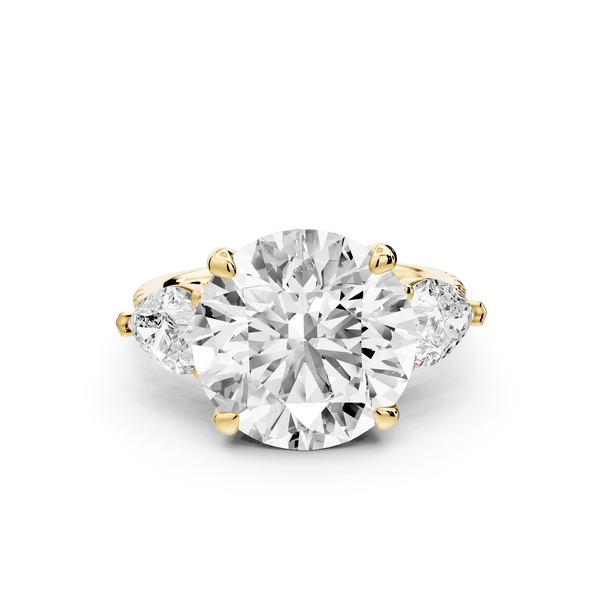 Alma - 5ct 14k yellow gold round center stone with two pear shaped diamonds and Pavé. Three stone oval and pear engagment ring with Pavé