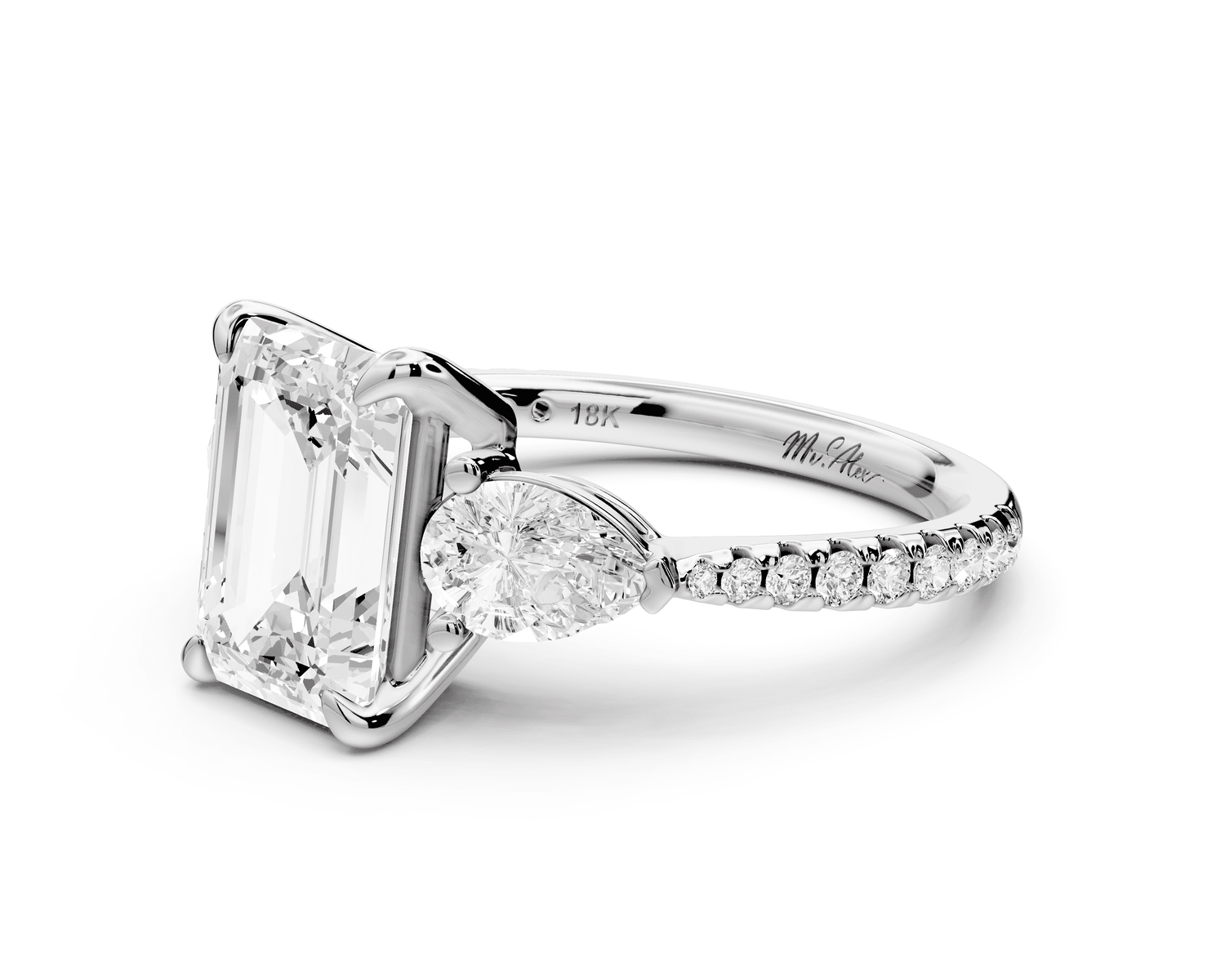 Alma - 2ct 18k white gold emerald center stone with two pear shaped diamonds and pavé. Three stone oval and pear Engagement ring with Pavé - Mr. Alex Jewelry
