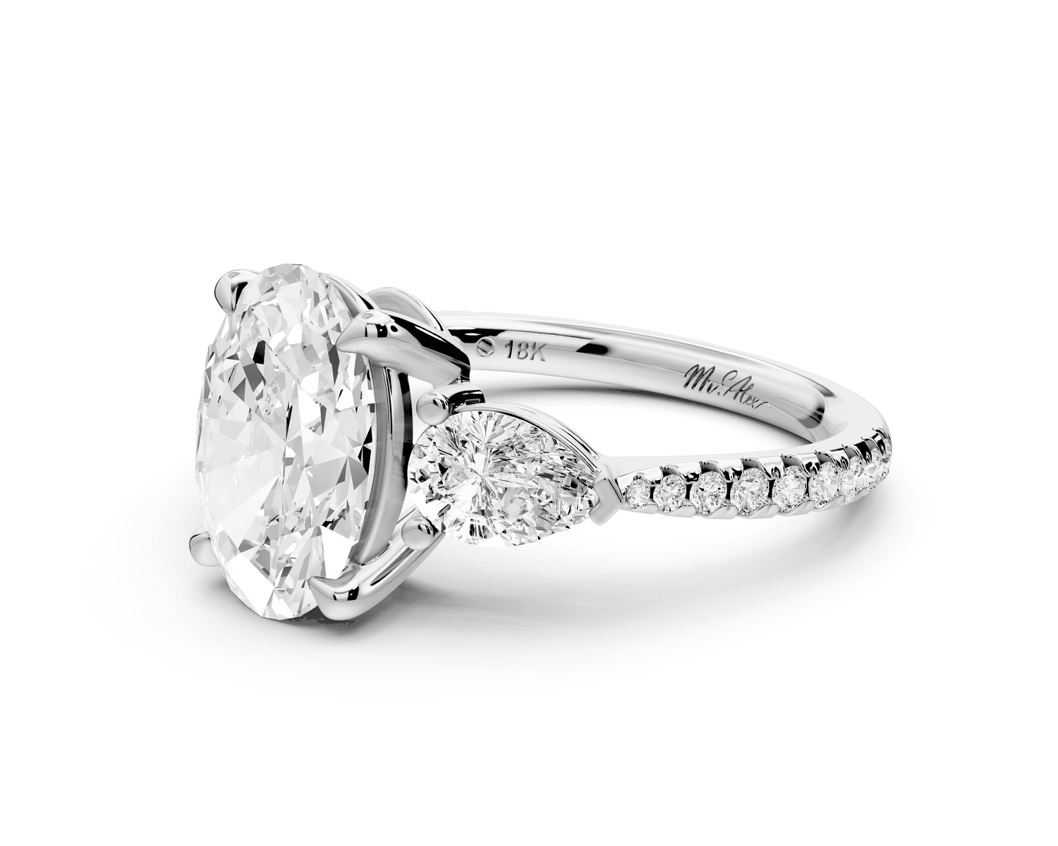 Alma - 2ct platinum oval center stone with two pear shaped diamonds and pavé. Three stone oval and pear Engagement ring with Pavé - Mr. Alex Jewelry