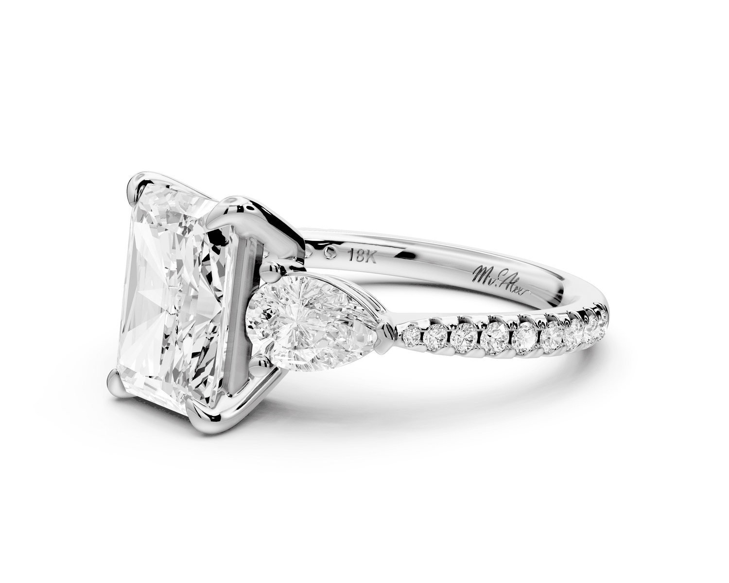 Alma - 2ct platinum radiant center stone with two pear shaped diamonds and pavé. Three stone oval and pear engagement ring with Pavé - Mr. Alex Jewelry