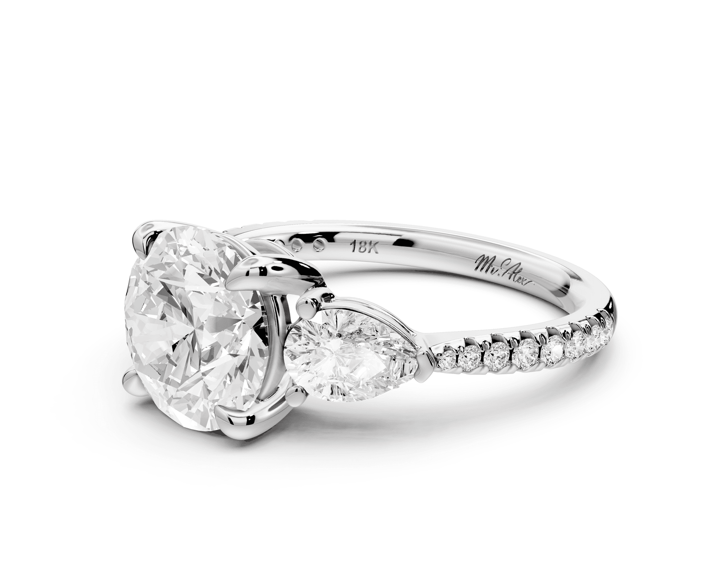 Alma - 2ct platinum round center stone with two pear shaped diamonds and pavé. Three stone oval and pear engagment ring with Pavé - Mr. Alex Jewelry