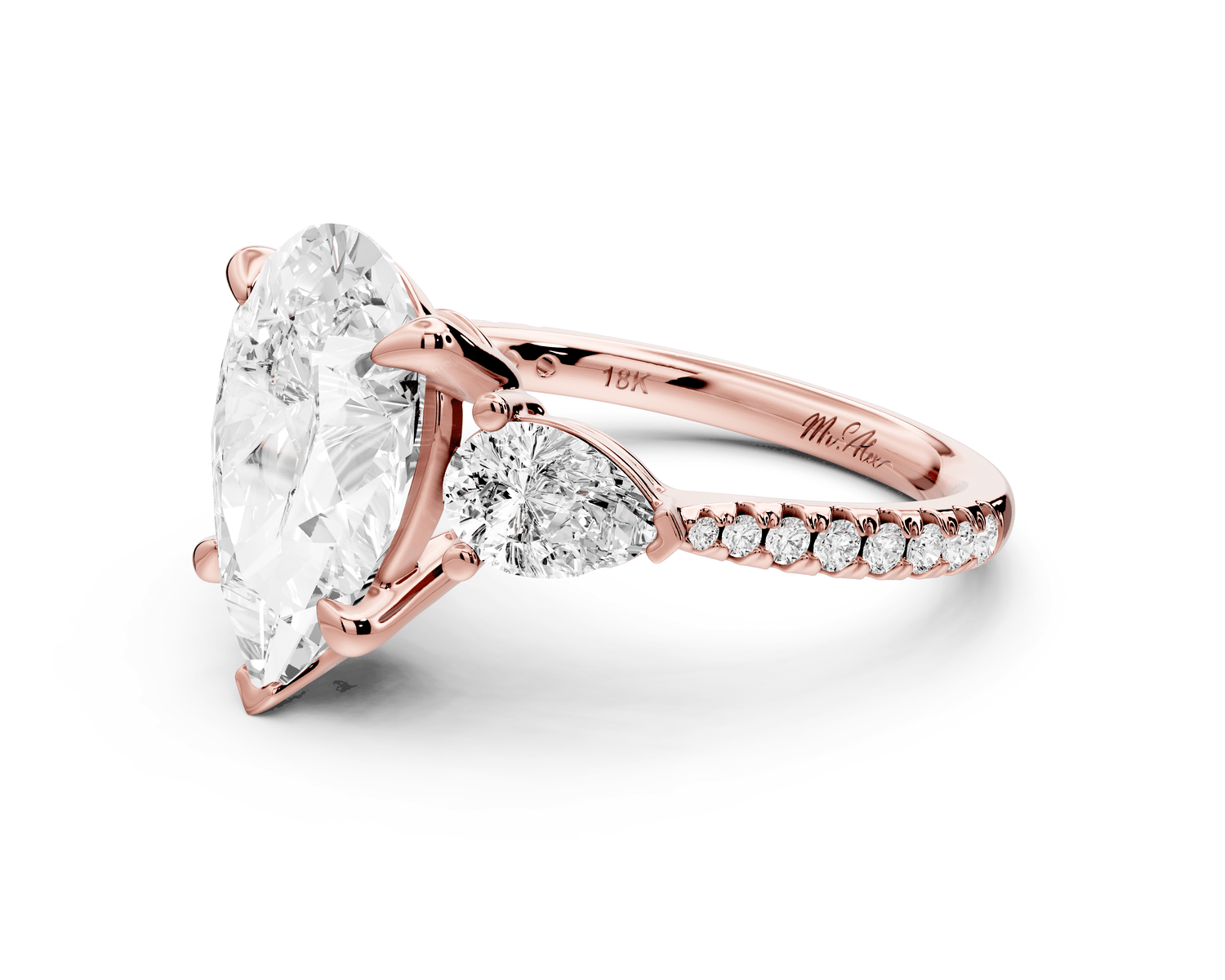 Alma - 3ct 18k rose gold pear center stone with two pear shaped diamonds and pavé. Three stone oval and pear Engagement ring with Pavé - Mr. Alex Jewelry