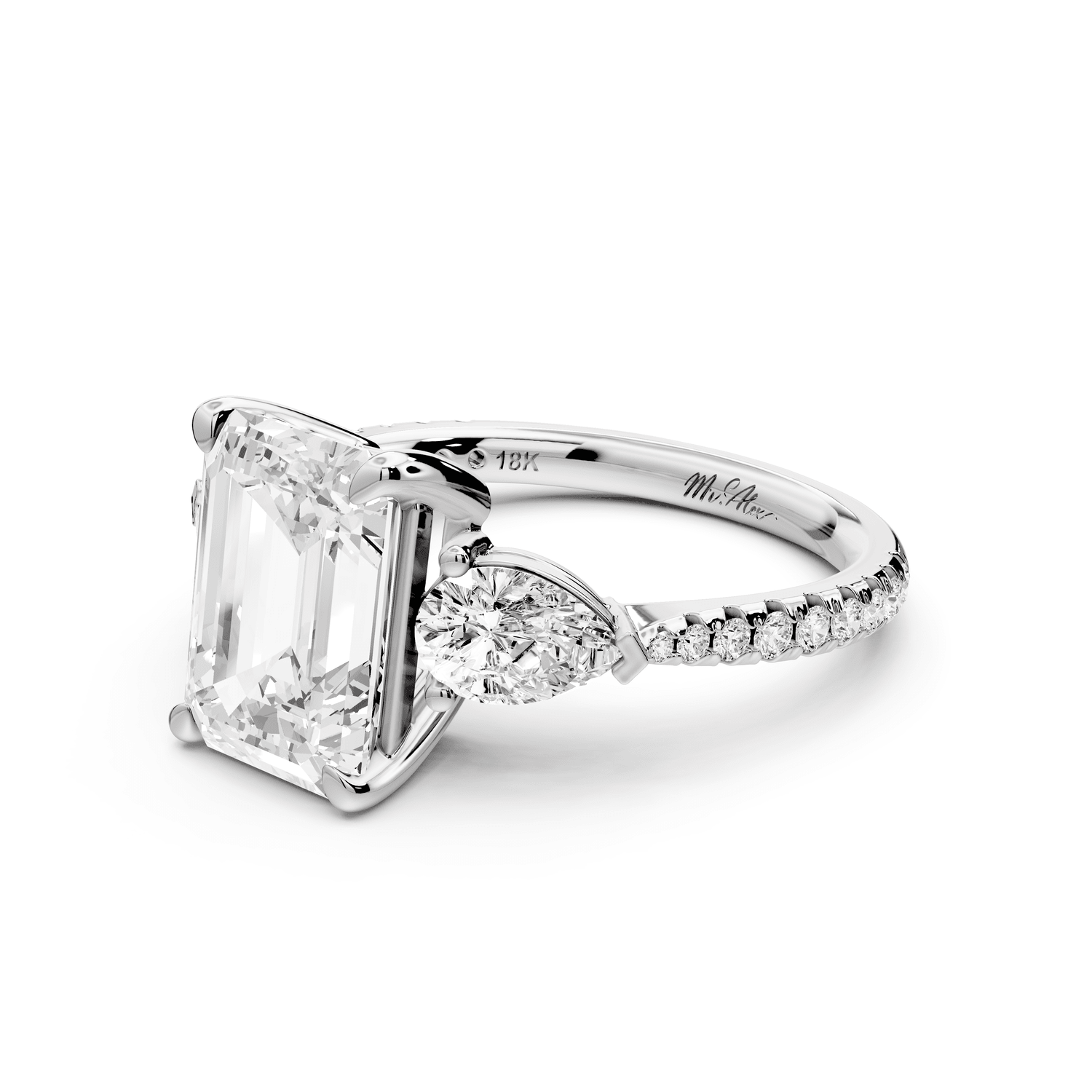 Alma - 3ct 18k white gold emerald center stone with two pear shaped diamonds and pavé. Three stone oval and pear Engagement ring with Pavé - Mr. Alex Jewelry