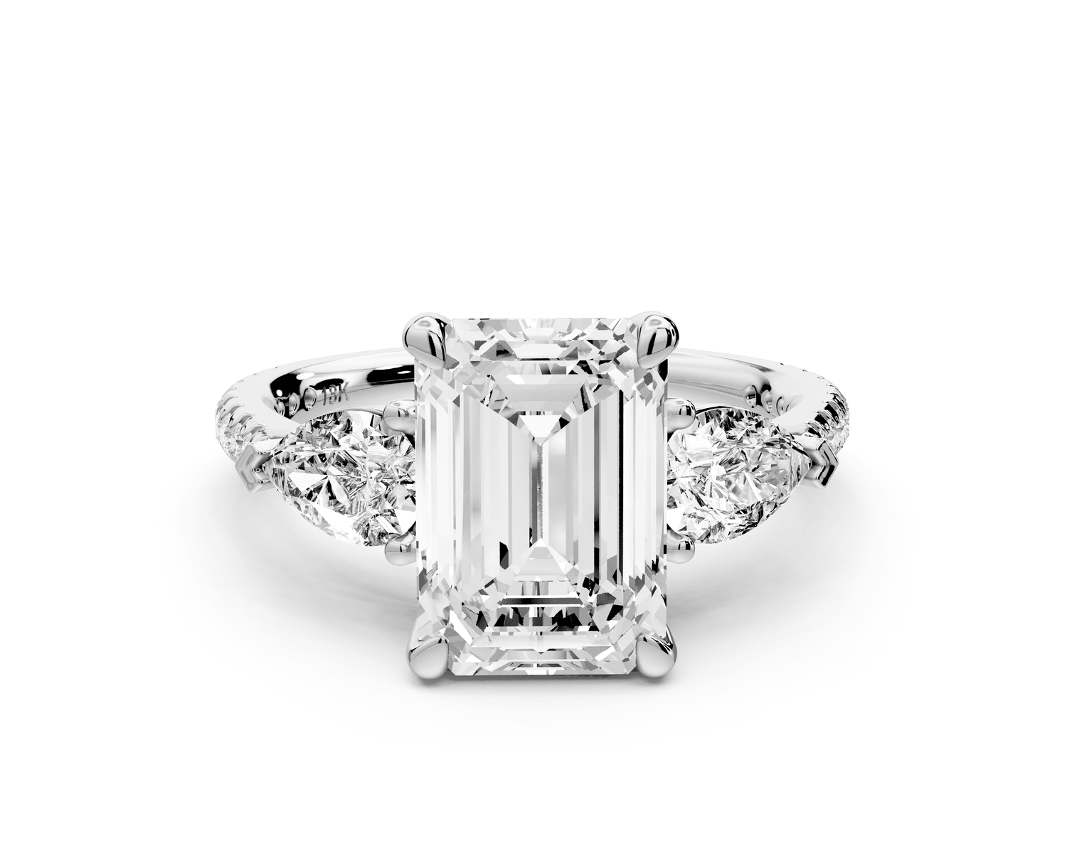Alma - 3ct 18k white gold emerald center stone with two pear shaped diamonds and pavé. Three stone oval and pear Engagement ring with Pavé - Mr. Alex Jewelry