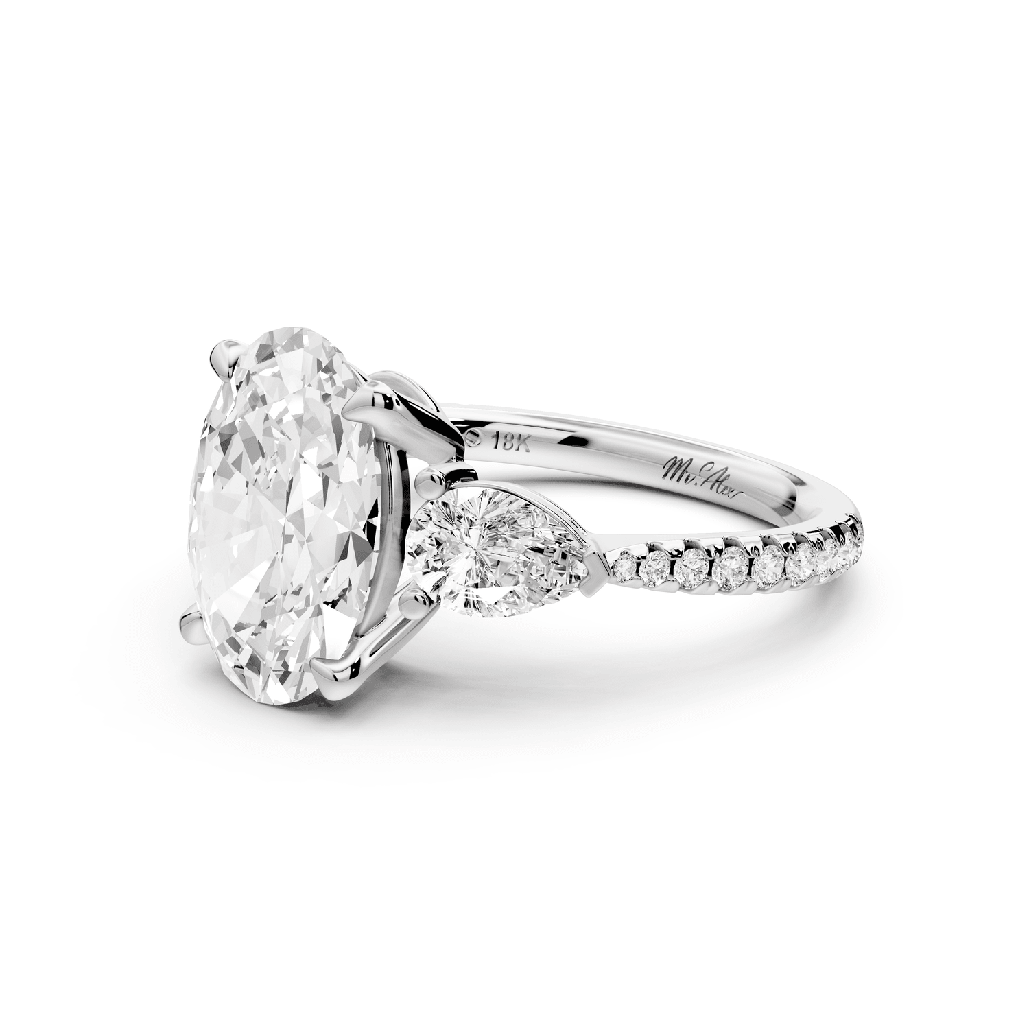 Alma - 3ct 18k white gold oval center stone with two pear shaped diamonds and pavé. Three stone oval and pear Engagement ring with Pavé - Mr. Alex Jewelry