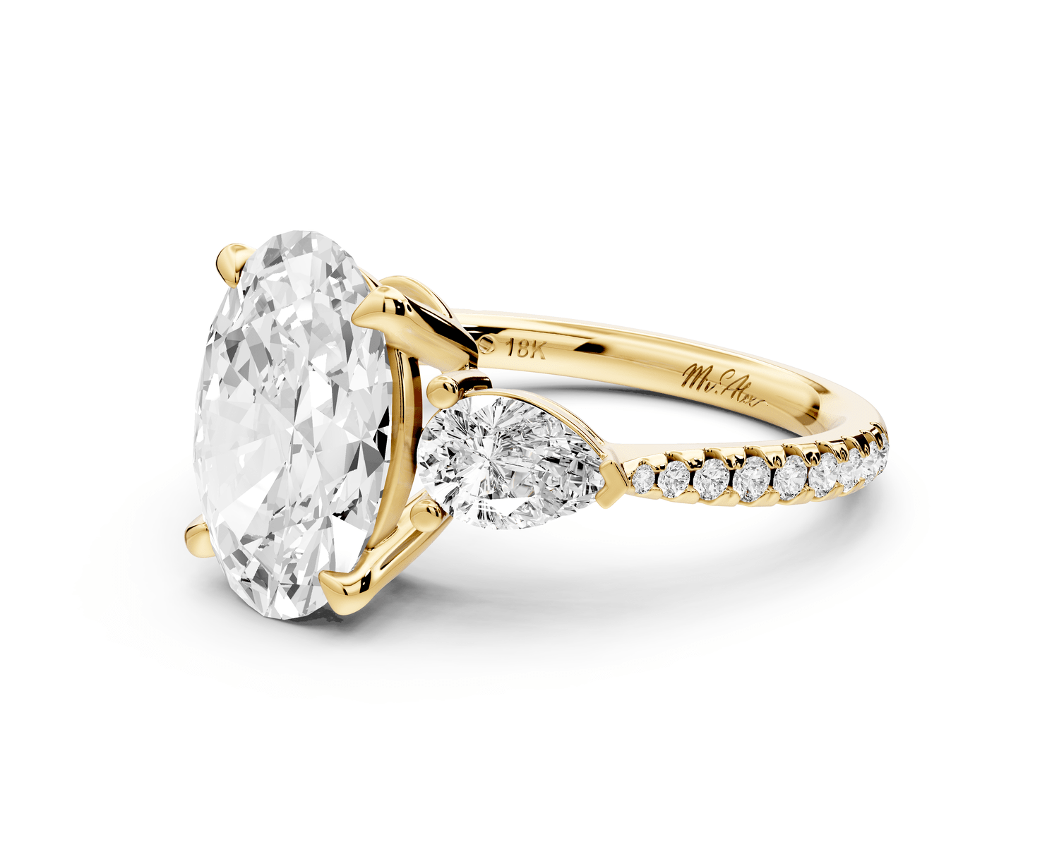 Alma - 3ct 18k yellow gold oval center stone with two pear shaped diamonds and pavé. Three stone oval and pear Engagement ring with Pavé - Mr. Alex Jewelry