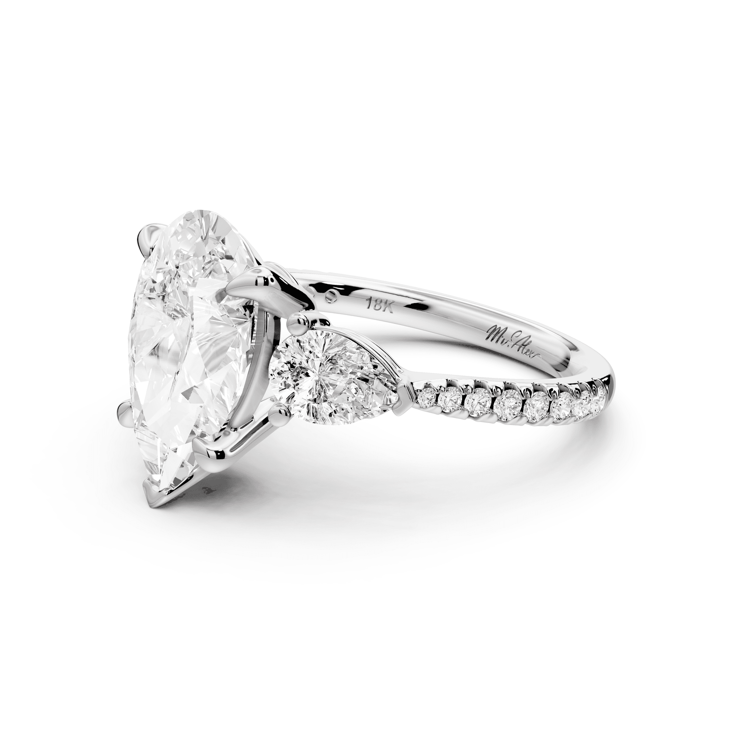 Alma - 3ct platinum pear center stone with two pear shaped diamonds and pavé. Three stone oval and pear Engagement ring with Pavé - Mr. Alex Jewelry