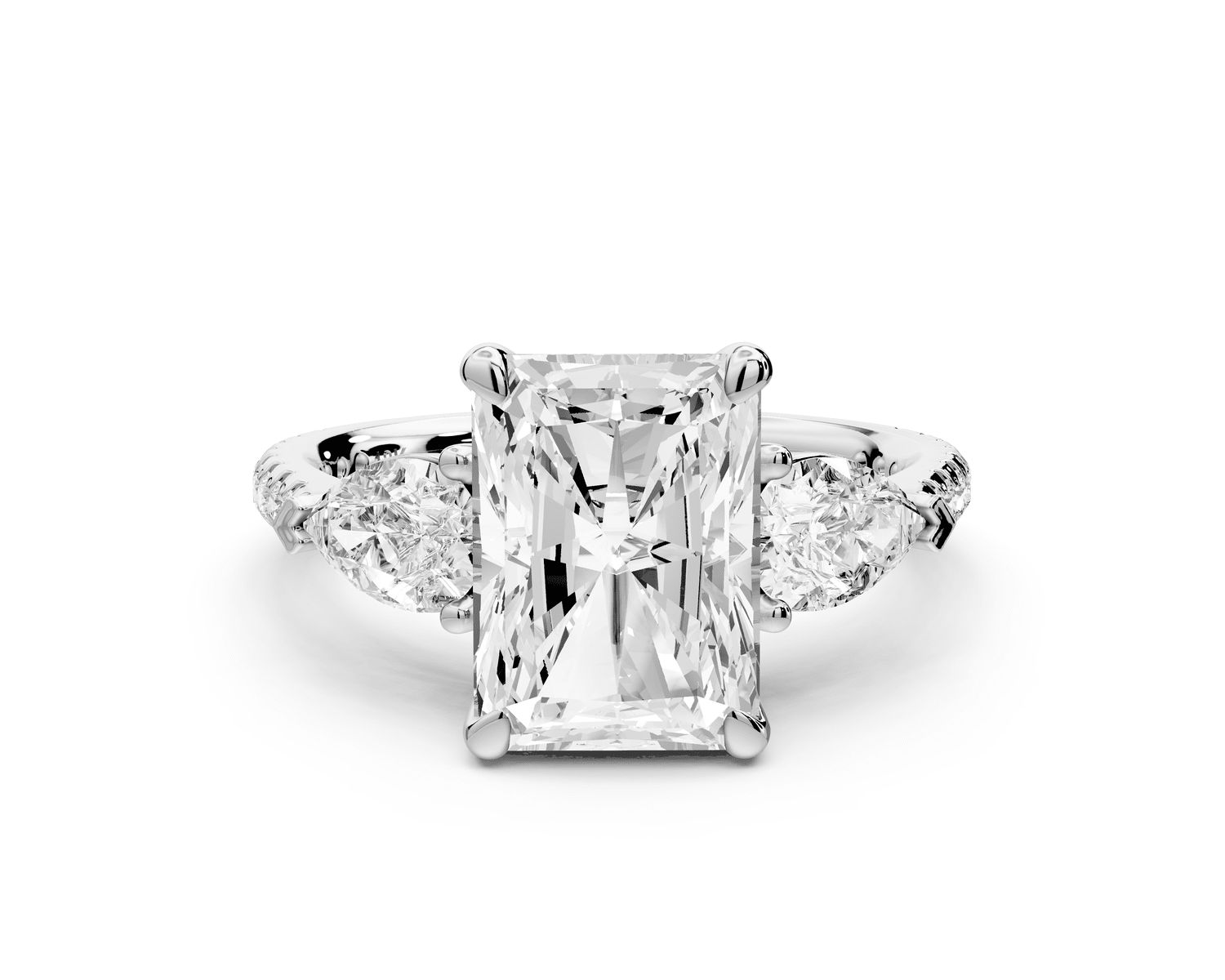 Alma - 3ct platinum radiant center stone with two pear shaped diamonds and pavé. Three stone oval and pear engagement ring with Pavé - Mr. Alex Jewelry