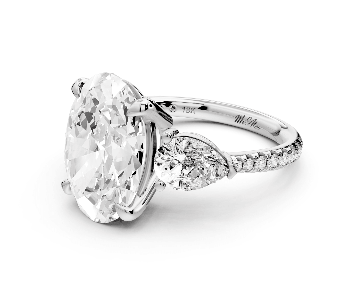 Alma - 4ct 18k white gold oval center stone with two pear shaped diamonds and pavé. Three stone oval and pear Engagement ring with Pavé - Mr. Alex Jewelry