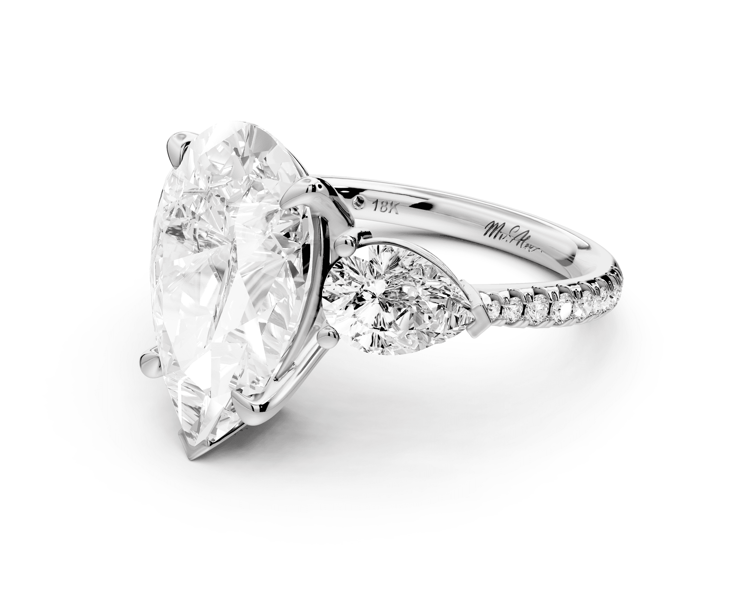 Alma - 4ct platinum pear center stone with two pear shaped diamonds and pavé. Three stone oval and pear Engagement ring with Pavé - Mr. Alex Jewelry