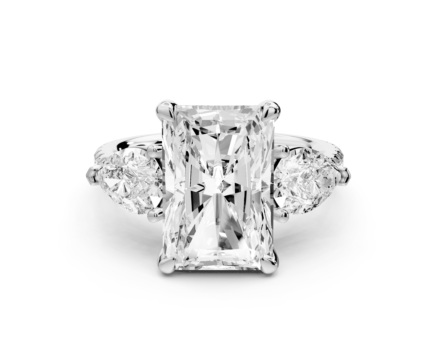 Alma - 4ct platinum radiant center stone with two pear shaped diamonds and pavé. Three stone oval and pear engagement ring with Pavé - Mr. Alex Jewelry