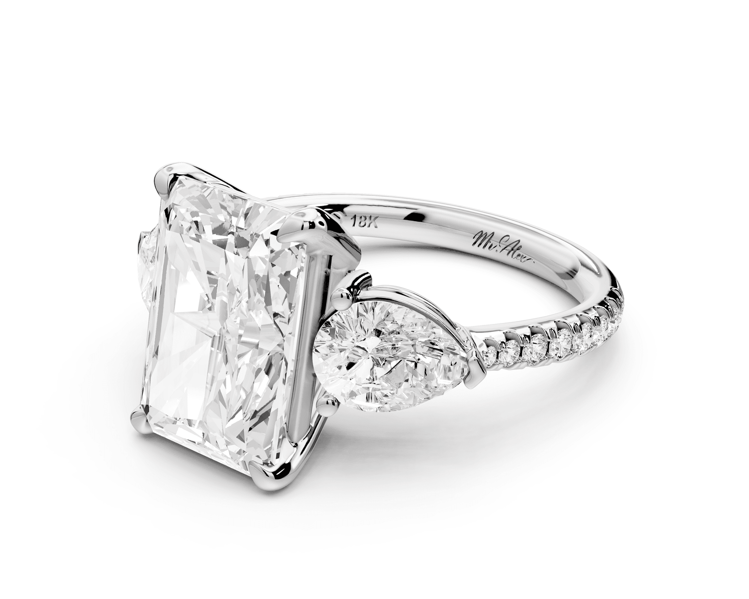 Alma - 4ct platinum radiant center stone with two pear shaped diamonds and pavé. Three stone oval and pear engagement ring with Pavé - Mr. Alex Jewelry