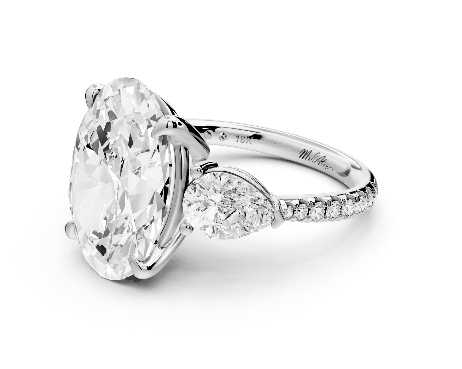 Alma - 5ct 18k white gold oval center stone with two pear shaped diamonds and pavé. Three stone oval and pear Engagement ring with Pavé - Mr. Alex Jewelry