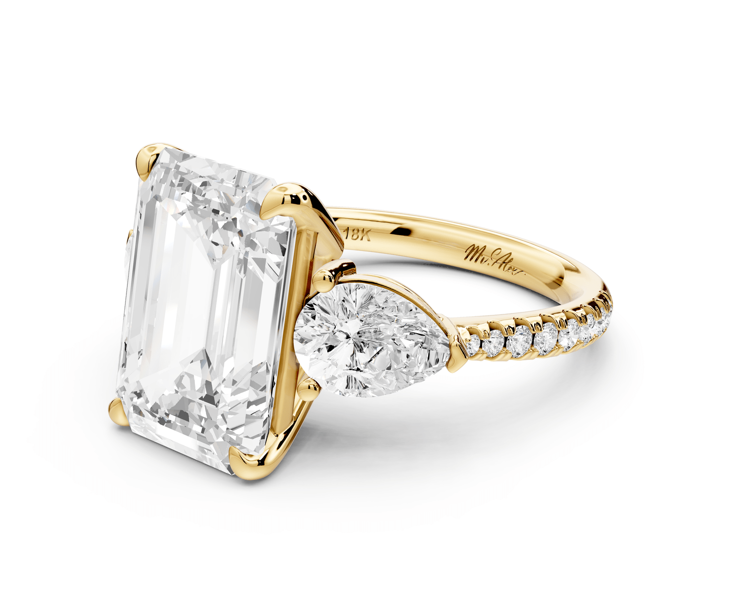 Alma - 5ct 18k yellow gold emerald center stone with two pear shaped diamonds and pavé. Three stone oval and pear Engagement ring with Pavé - Mr. Alex Jewelry