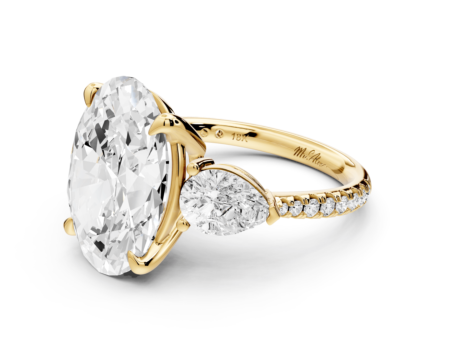 Alma - 5ct 18k yellow gold oval center stone with two pear shaped diamonds and pavé. Three stone oval and pear Engagement ring with Pavé - Mr. Alex Jewelry