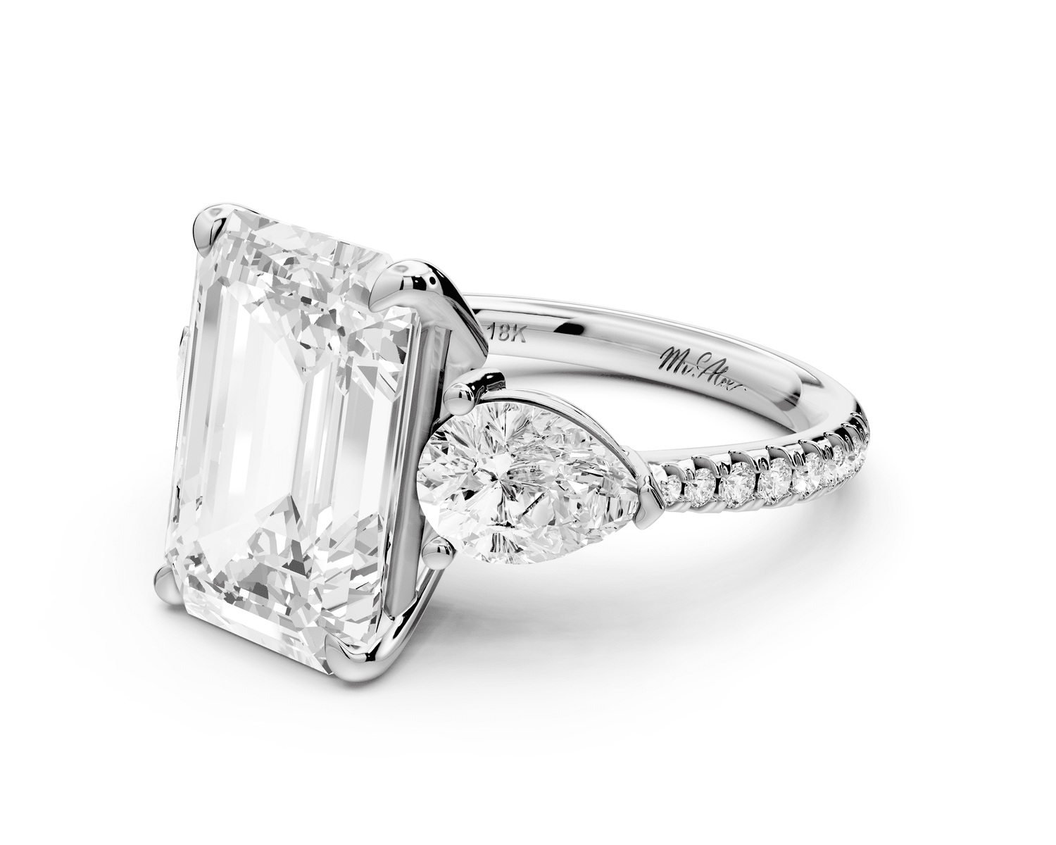 Alma - 5ct platinum emerald center stone with two pear shaped diamonds and pavé. Three stone oval and pear Engagement ring with Pavé - Mr. Alex Jewelry