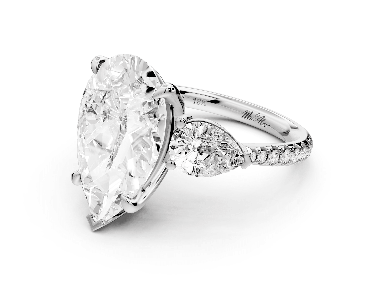 Alma - 5ct platinum pear center stone with two pear shaped diamonds and pavé. Three stone oval and pear Engagement ring with Pavé - Mr. Alex Jewelry